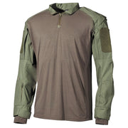 Camisa táctica UBACS verde con cuerpo de algodón, mangas y cuello rip-stop, 6 bolsillos y paneles velcro