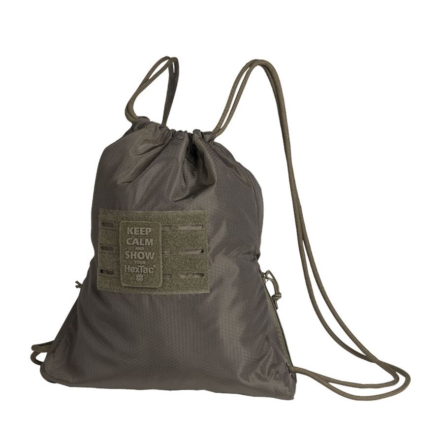 Mochila HEXTAC deportiva verde vista frontal con panel MOLLE, panel de velcro y estructura hexagonal HexTac, capacidad 7 litros