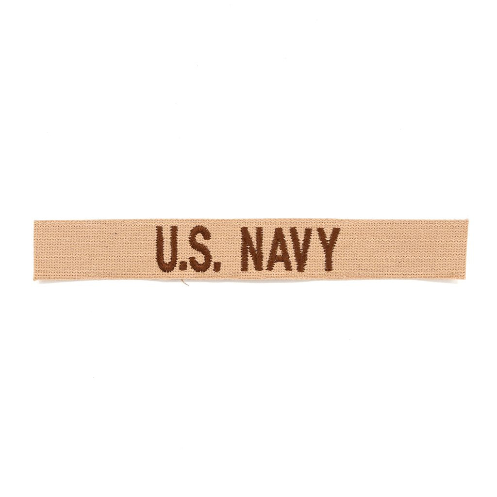 Parche bordado 'U.S. NAVY' sobre fondo desierto, fabricado en EE. UU., para coser en prendas