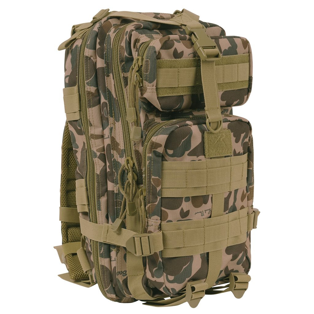 Mochila ASSAULT I Medium Transport, vista de producto con sistema MOLLE y múltiples bolsillos
