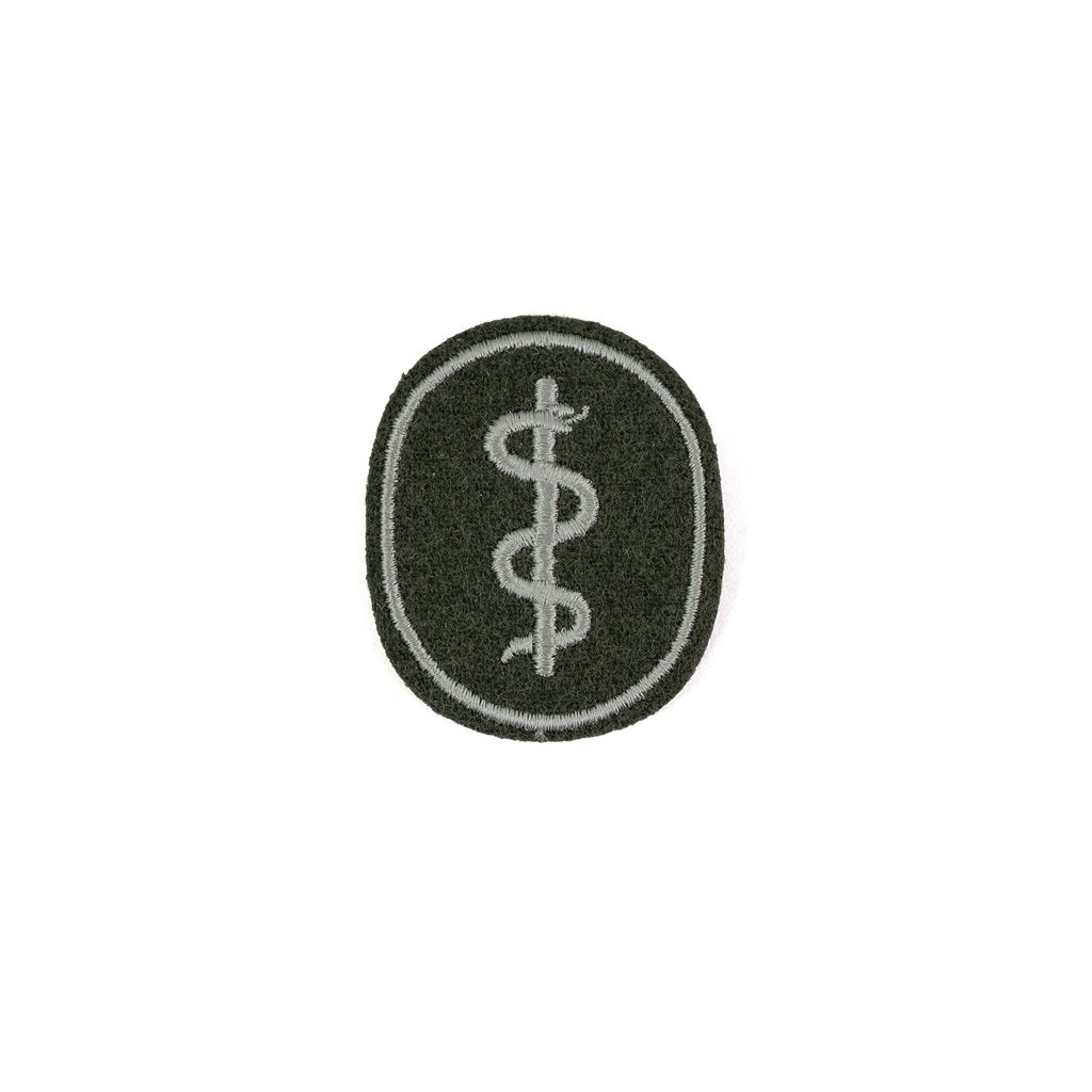 Parche oval NVA con texto 'MEDIZINER', aprox. 5 x 6 cm