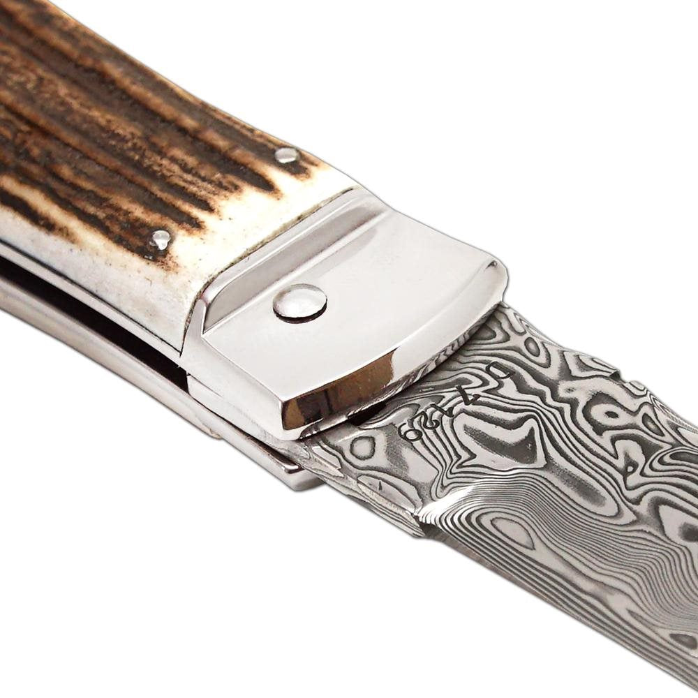 Cuchillo lanzador de acero damasco con empuñadura de asta de ciervo y funda de cuero