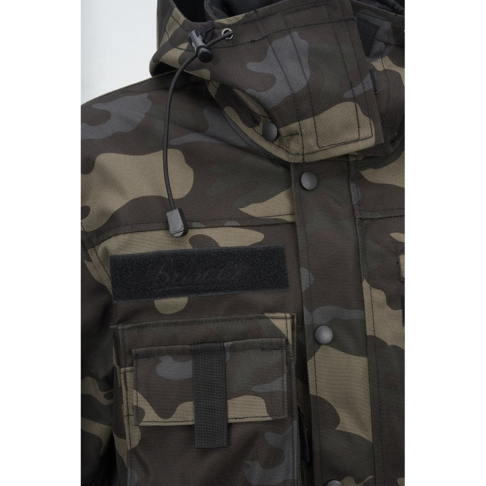 Chaqueta PERFORMANCE BRANDIT en tejido 900D/500D mostrando bolsillos y cierre central