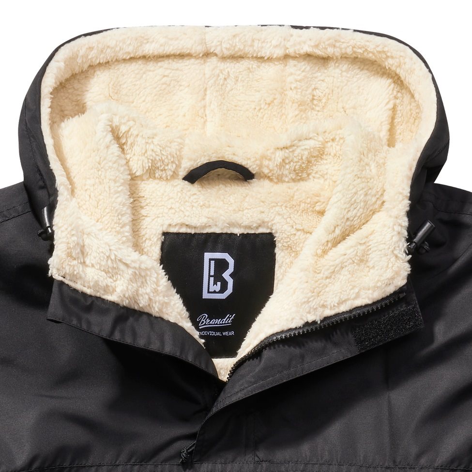Cazadora Windbreaker Sherpa Negra con forro de piel sintética y cremalleras visibles