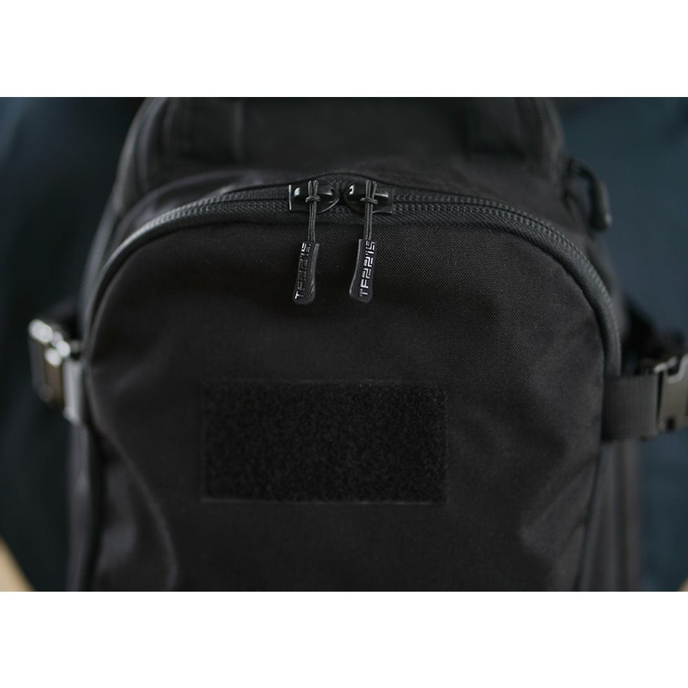 Mochila BUSHMATE PRO negra en Cordura 500D con funda reflectante naranja integrada