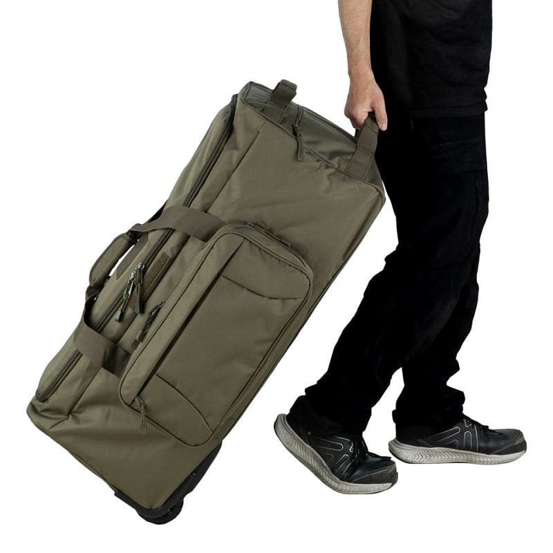 Bolsa de viaje COMMANDO negra 124 L con tres ruedas y bolsa desmontable