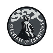 Parche 3D de plástico con texto 'Sex Breakfast of Champions' y respaldo para velcro