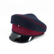 Gorro brigadýrka británico de mujer en azul oscuro y púrpura