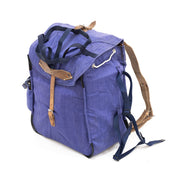 Mochila militar rumana de lona azul usada con correas de cuero