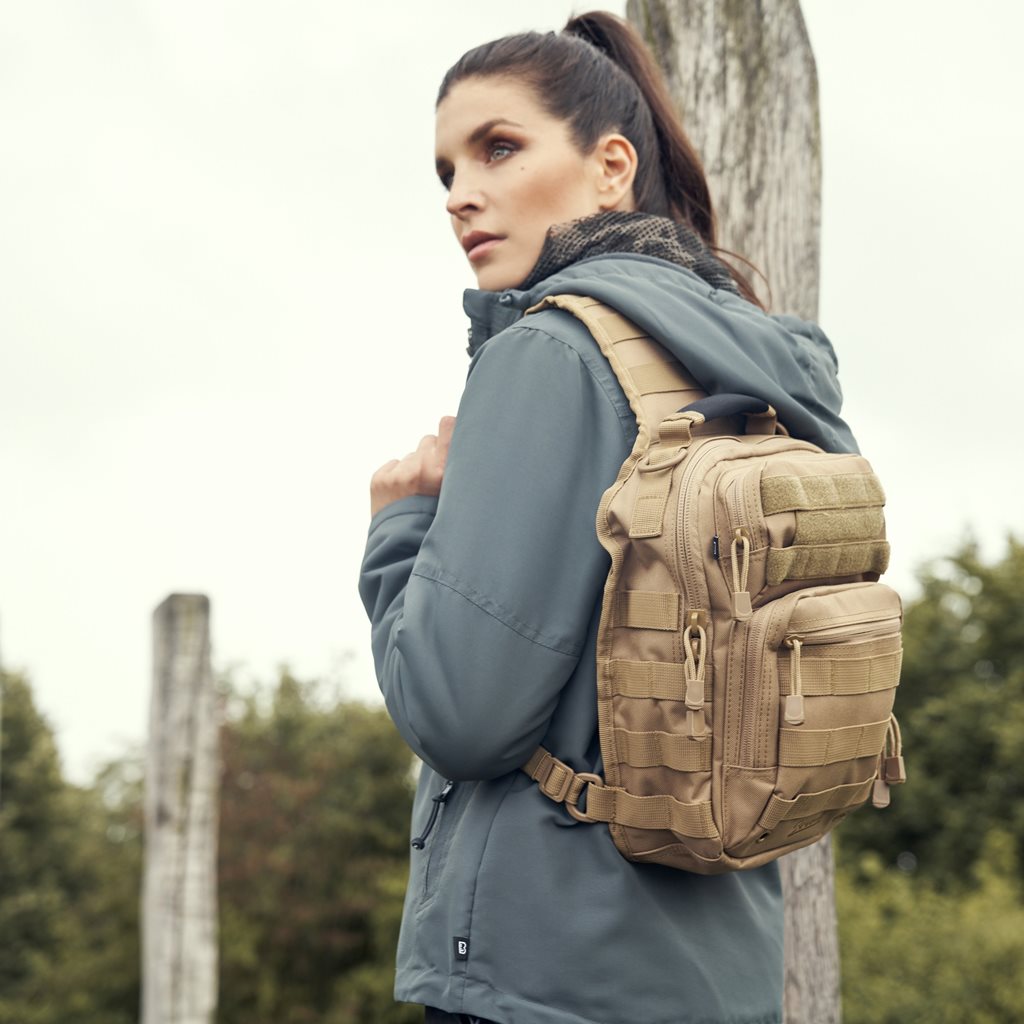 Bolsa bandolera US Cooper Sling negra 8 l en poliester 600D con sistema MOLLE/PALS y funda para tablet
