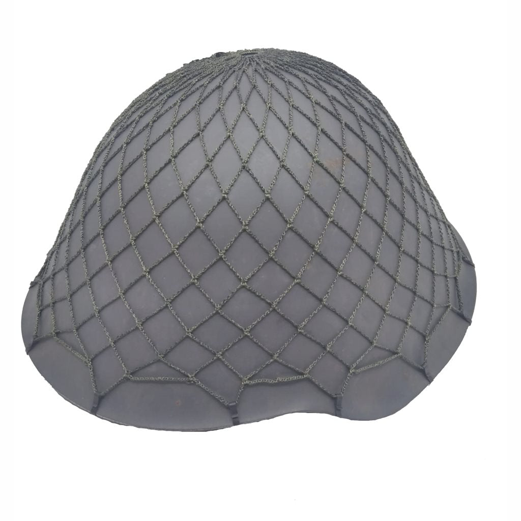 Casco NVA verde con red de camuflaje, usado, material: acero