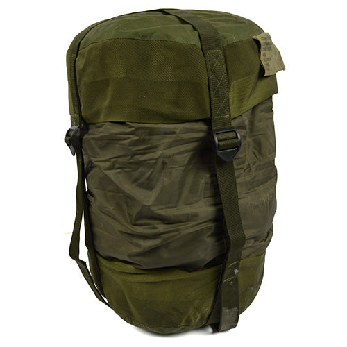 Bolsa compresora militar verde para saco de dormir, usada, con correas, aprox. 20x33 cm