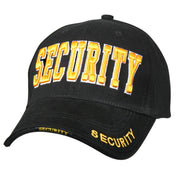 Gorra DELUXE SECURITY negra con inscripción amarilla bordada, cierre velcro y ala superpuesta