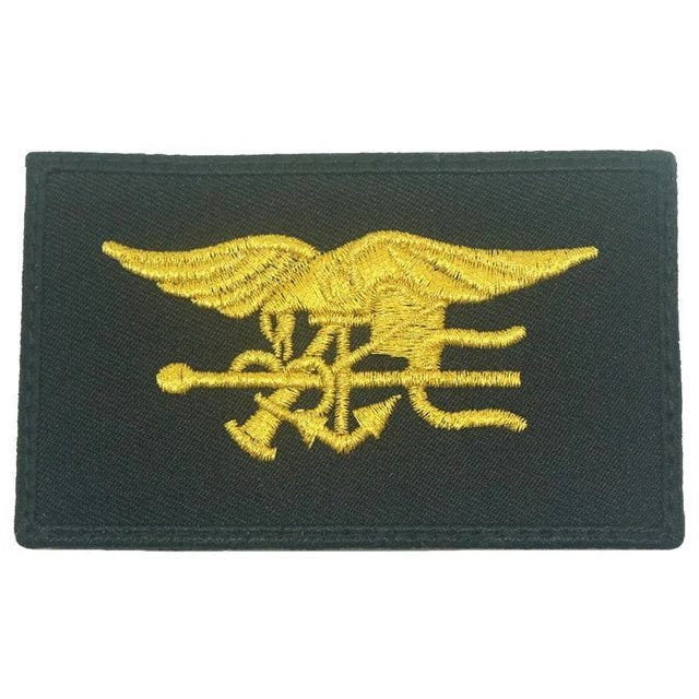 Parche NAVY SEAL velcro con bordado dorado sobre fondo negro, tamaño aprox. 4,7 x 8 cm
