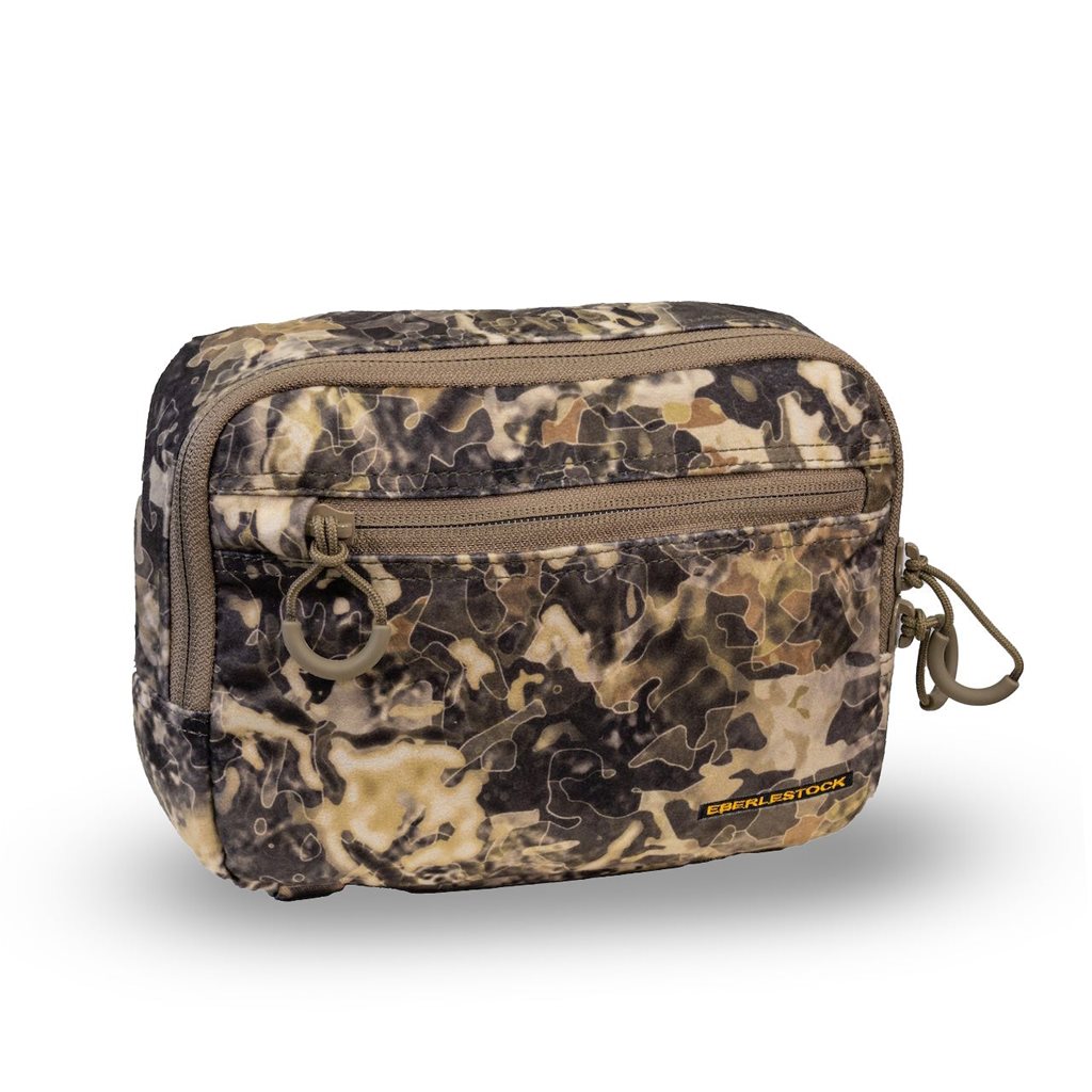 Funda A2SP Eberlestock compatible con MOLLE/PALS, vista que muestra dos bolsillos con cremalleras y tiradores.