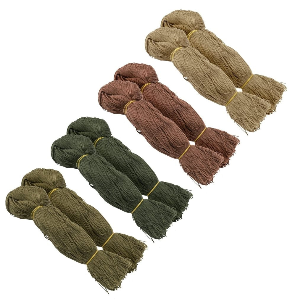Haces de flecos ghillie en combinación US Woodland para camuflaje.
