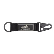 Llavero con mosquetón logo HELIKON-TEX negro, cuerpo de nylon y anilla de acero