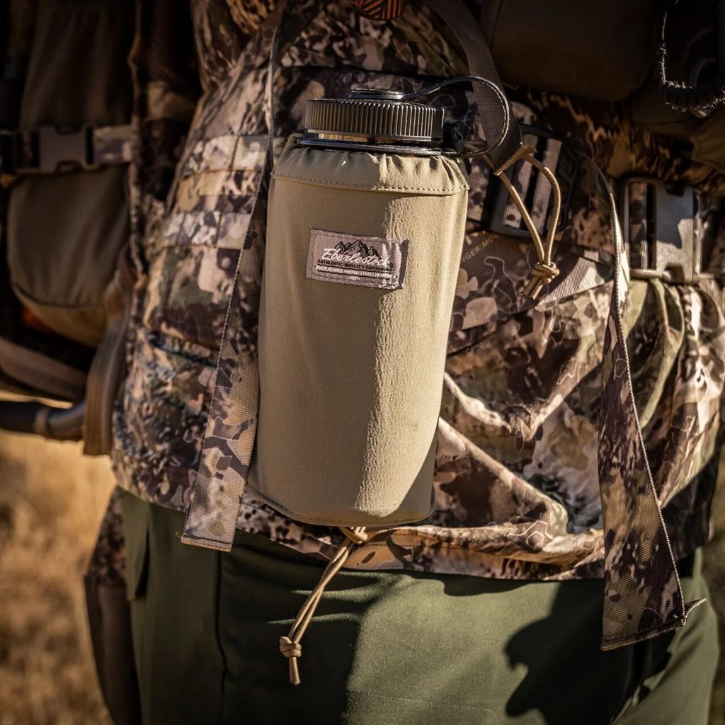 Funda DOUBLE THREAT para botella con fijación MOLLE/PALS y cordones elásticos con topes de plástico