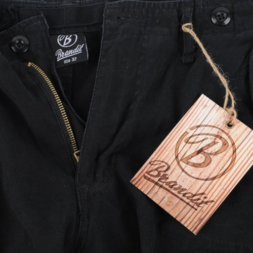 Pantalones M65 para mujer en negro, corte amplio con bolsillos de solapa y cierres a presión