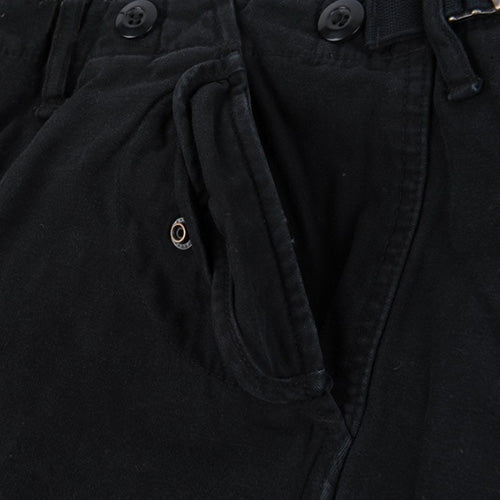 Pantalones M65 para mujer en negro, corte amplio con bolsillos de solapa y cierres a presión