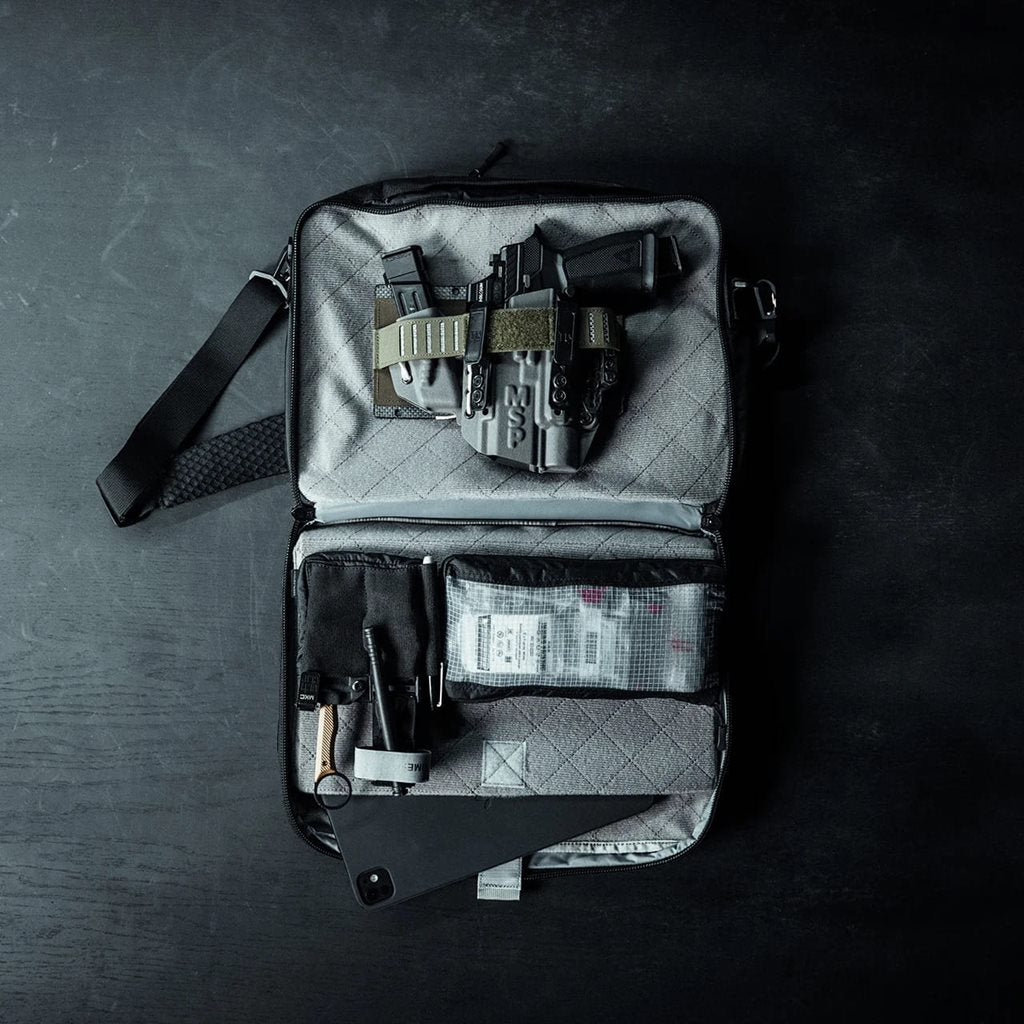 Bolsa bandolera FADE BRIEF negra Eberlestock, para portátil y porte oculto