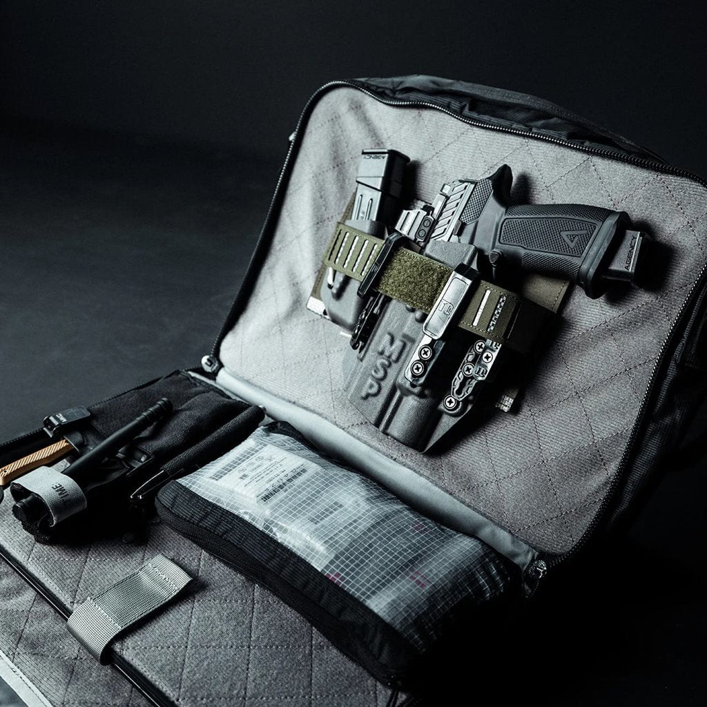 Bolsa bandolera FADE BRIEF negra Eberlestock, para portátil y porte oculto