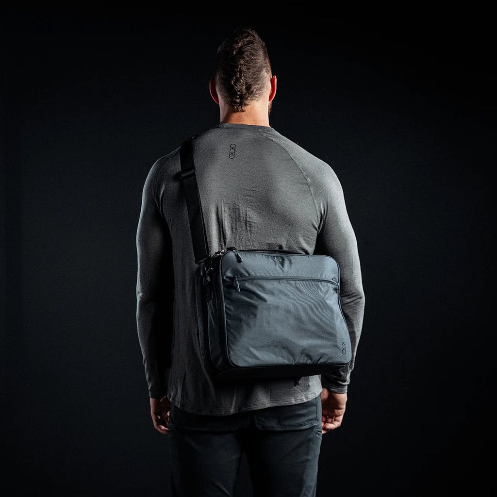 Bolsa bandolera FADE BRIEF negra Eberlestock, para portátil y porte oculto