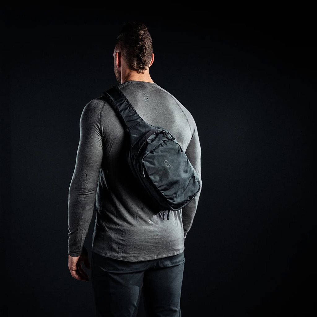 Mochila bandolera táctica FADE SLING gris en nylon 210D rip-stop para transporte discreto