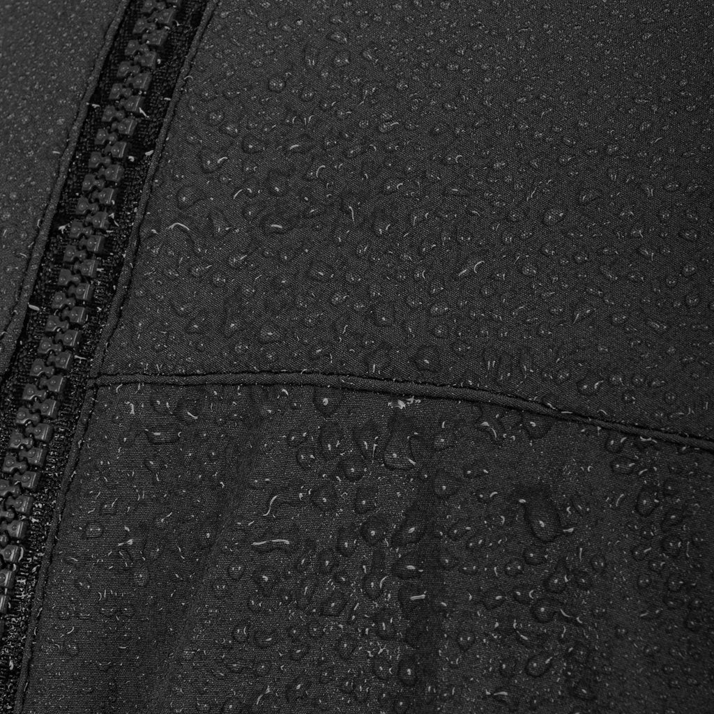 Chaqueta HIRTA HELL negra, ligera, resistente al agua y al viento, con cierre central y dos bolsillos
