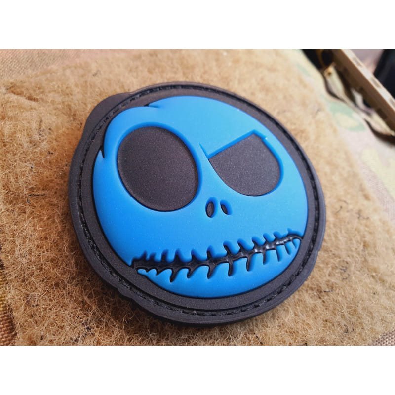 Parche NIGHTMARE SMILEY plástico azul que brilla en la oscuridad, diámetro aprox. 6 cm