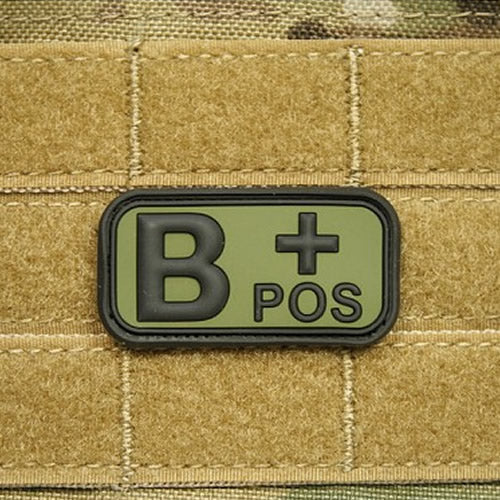Parche plástico verde indicación grupo sanguíneo B positivo 5 x 2,5 cm con velcro
