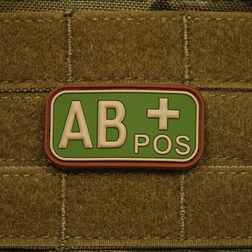 Parche de plástico con indicación del grupo sanguíneo 0 NEG, aprox. 5 x 2,5 cm, reverso con velcro