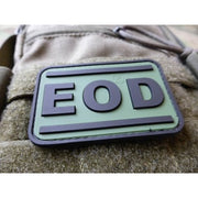 Parche plástico verde con inscripción EOD (Explosive Ordnance Disposal), aprox. 7 x 4,5 cm