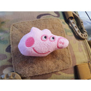 Cabeza de peluche de cerdito rosa en parche con velcro