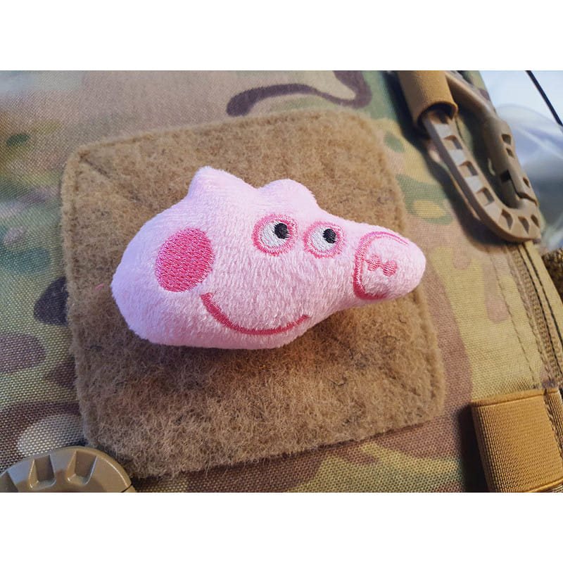 Cabeza de peluche de cerdito rosa en parche con velcro