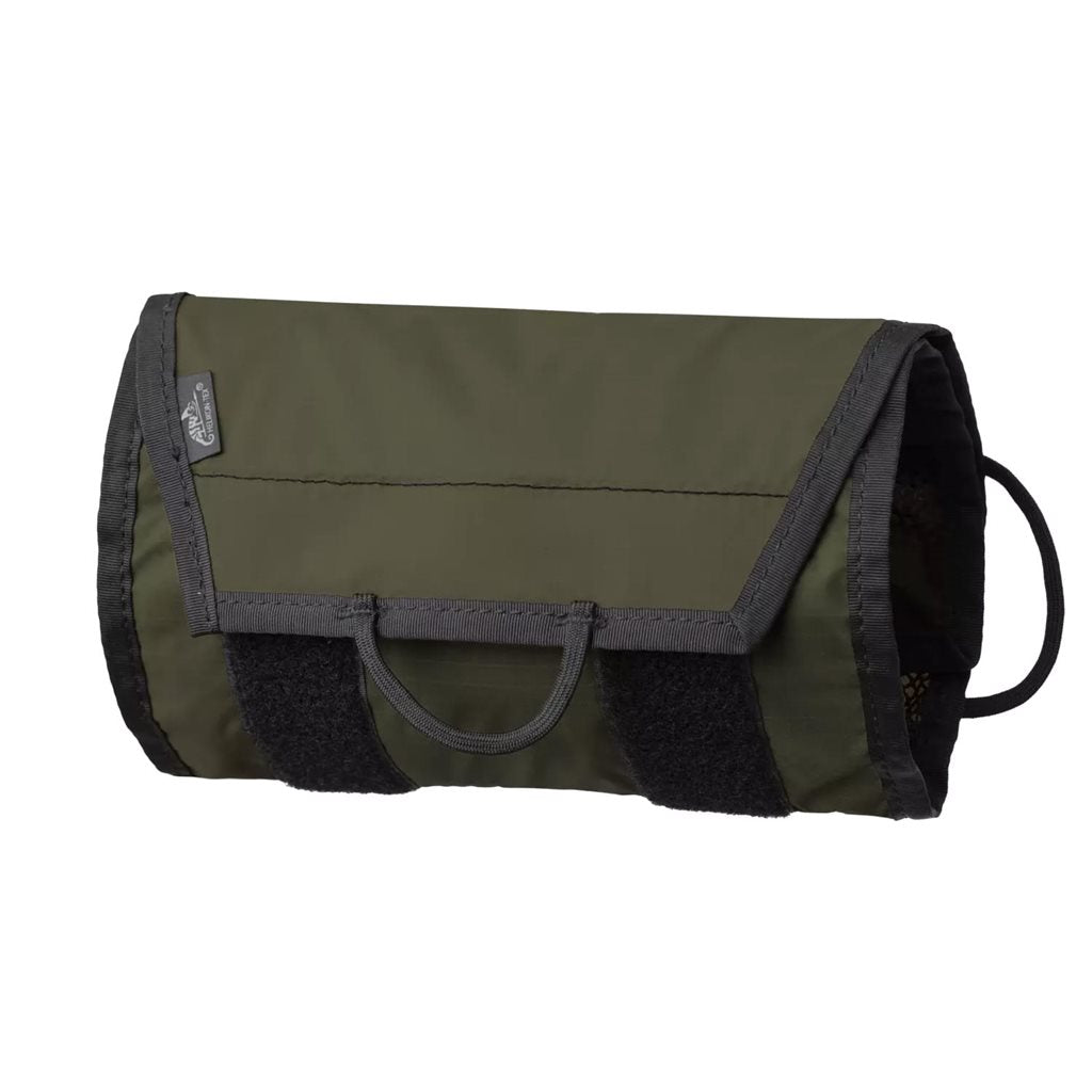 Organizador TRIP ROLL enrollable negro con tres bolsillos de malla y elásticos, 100% nylon