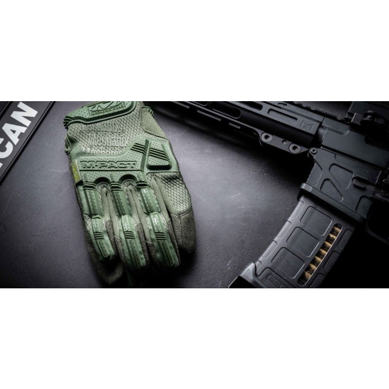 Guantes Mechanix M-Pact verde brillante con protecciones de EVA en el dorso y relleno de gel en la palma