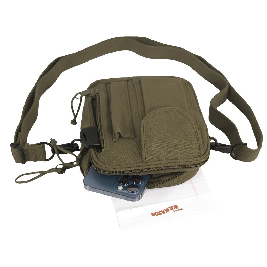 Bandolera EXCURSION negra en lona resistente estilo army con cremalleras y bolsillo exterior para movil