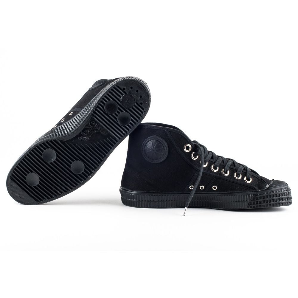 Zapatillas tobilleras negras de lona con suela de goma y plantilla extraíble