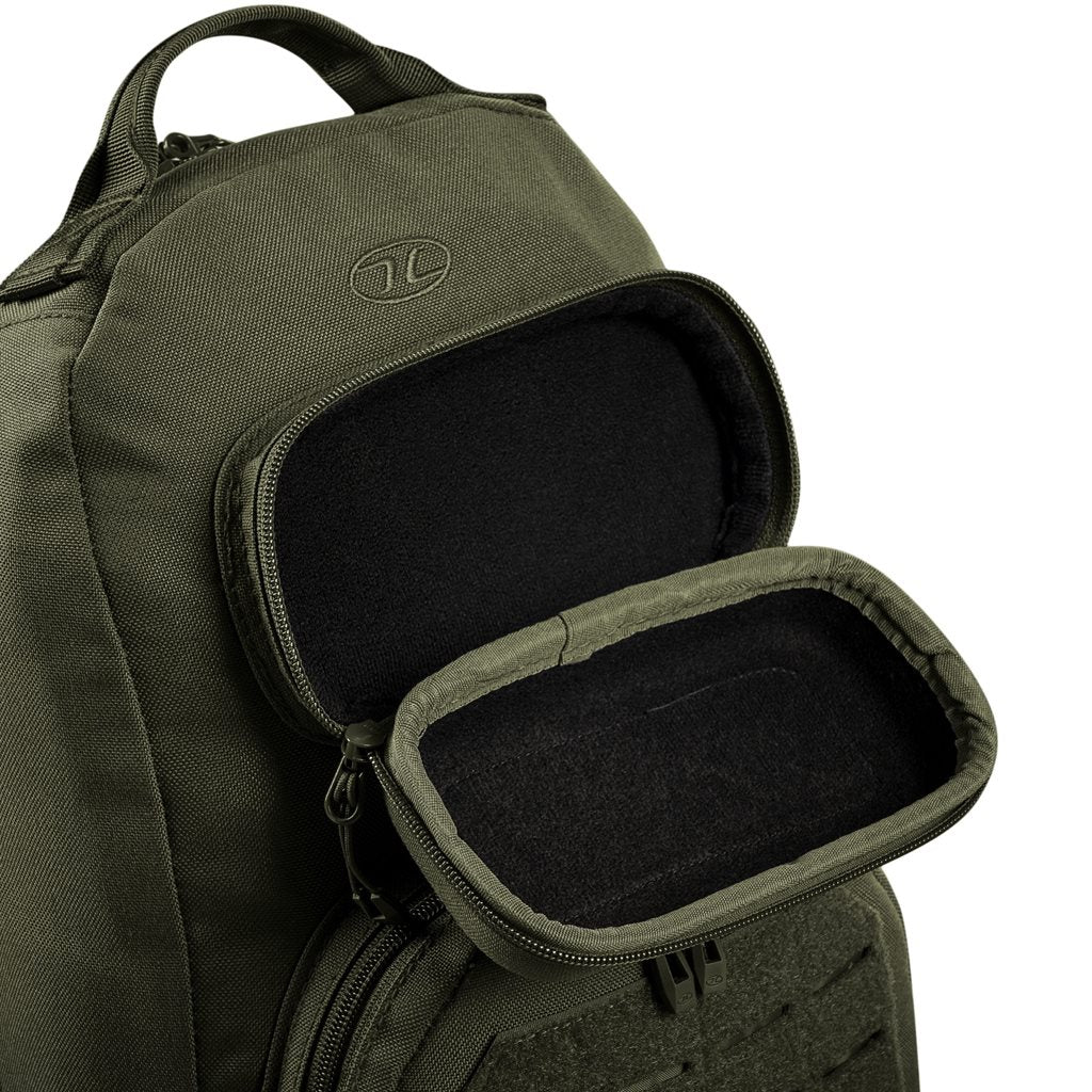 Mochila bandolera STOIRM GEARSLINGER 12 L verde con hebillas Duraflex y cremallera YKK