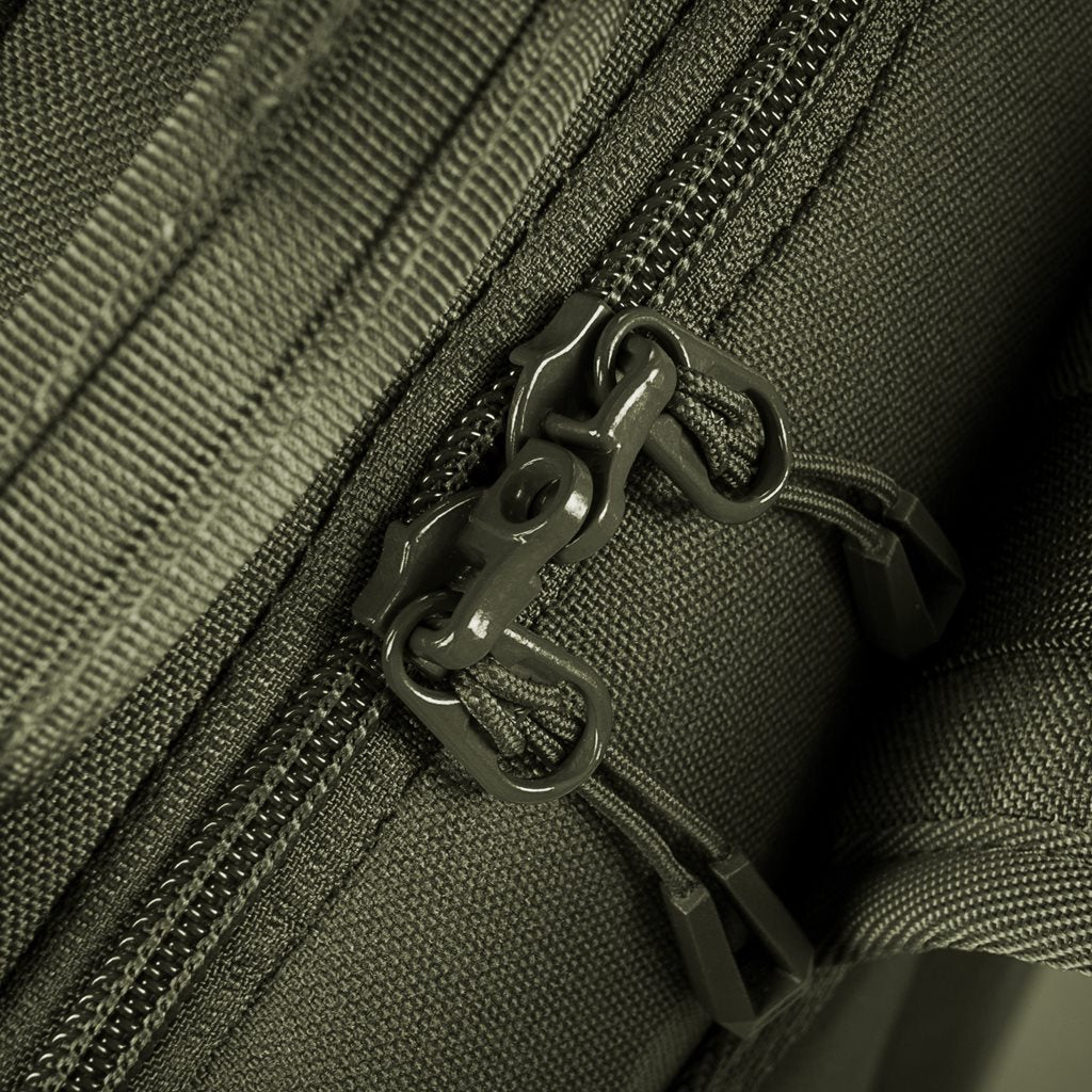 Mochila bandolera STOIRM GEARSLINGER 12 L verde con hebillas Duraflex y cremallera YKK