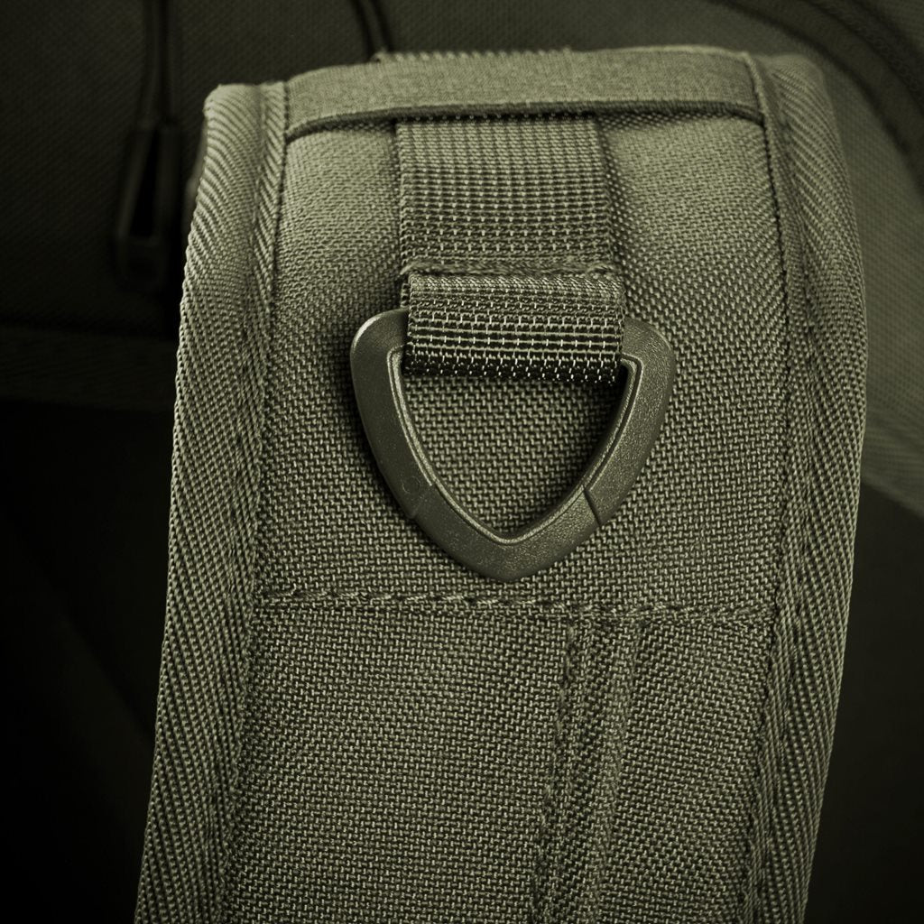 Mochila bandolera STOIRM GEARSLINGER 12 L verde con hebillas Duraflex y cremallera YKK