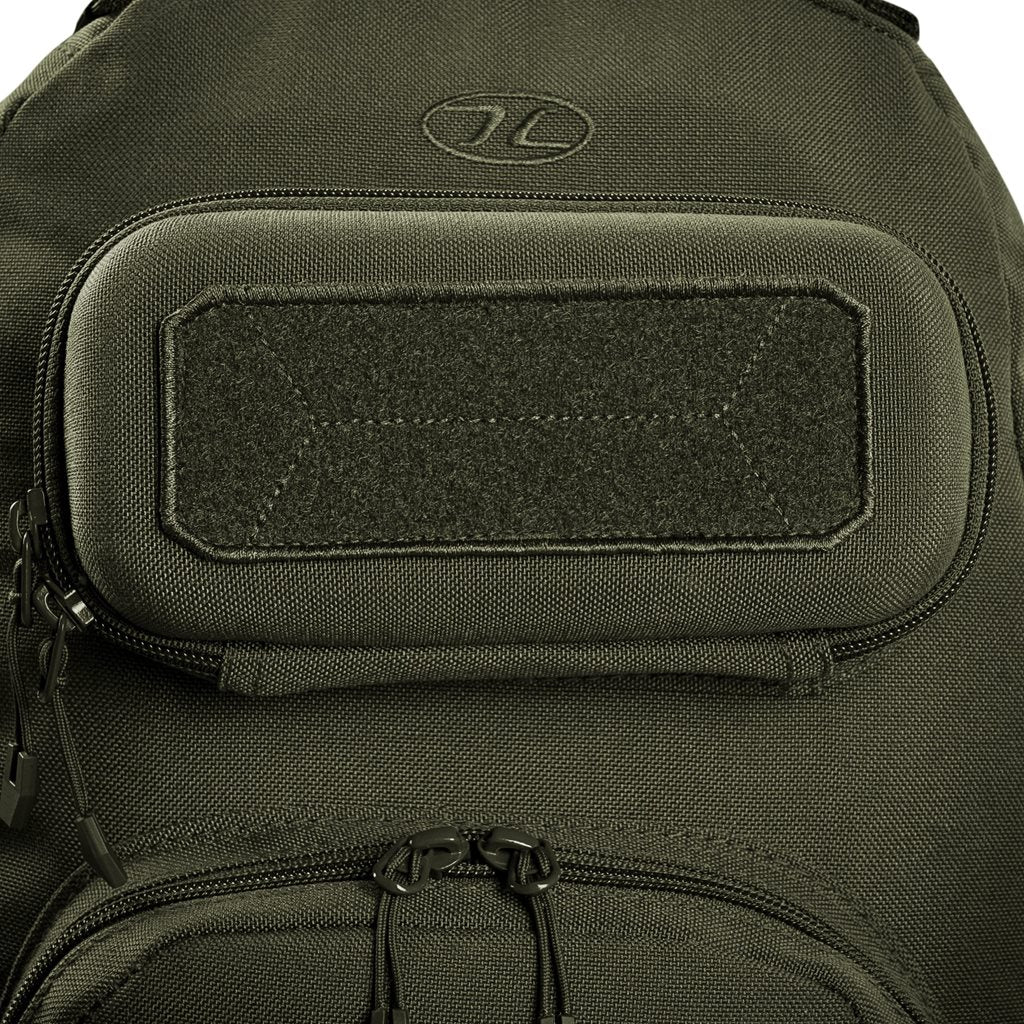 Mochila bandolera STOIRM GEARSLINGER 12 L verde con hebillas Duraflex y cremallera YKK