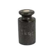 Peso de hierro fundido negro 1 kg, marca de calibración vencida, fabricado aprox. años 70-80