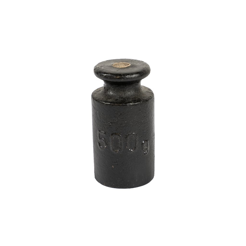Peso de hierro fundido negro 500 g, marcado y almacenado, producción aprox. años 70-80